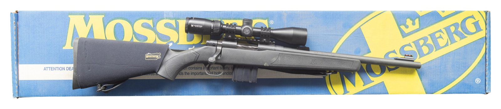 MOSSBERG MVP PATROL BOLT ACTION RIFLE.: Cal. 5.56mm (NATO). S# MVP056527. Bbl.16 1/4". Fiber optic front sight. Rear iron sight removed. Receiver mounted Vortex Crossfire 3-9x40 scope. Scope has bikini cover, duplex crosshair reticle & very