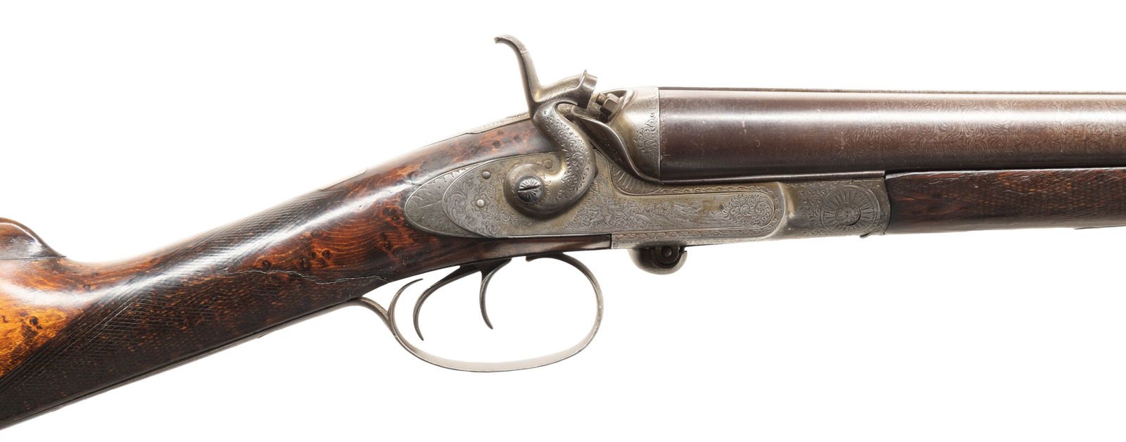 JAMES ADSETT OF CANTERBURY, ENGLAND CONVERTED: UNDERLEVER SXS HAMMER SHOTGUN. Cal. 12 Ga. S# 2050. This shotgun most likely started as a percussion sxs gun, then converted to take 12 Ga., 2 1/2" shells; chambers appear to be reamed out for 2 3/4"