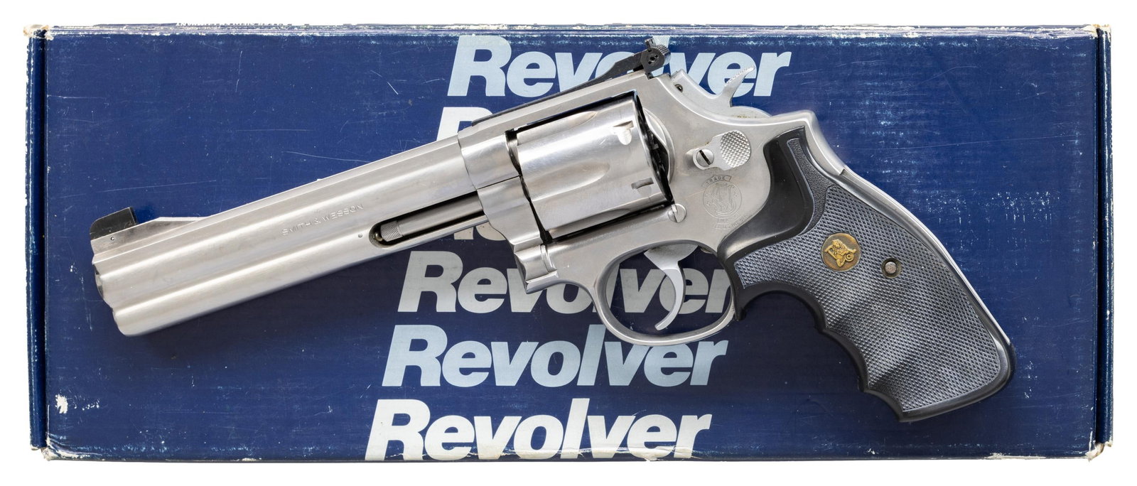 SMITH & WESSON MODEL 686-1 DA REVOLVER.: Cal. 357 Mag. S# AWM4369. Bbl. 6" with full underlug. Blade front sight. Adjustable square notch rear sight. 6-shot cyl. Stainless finish with hard chrome hammer & trigger. Pachmayr "The Gripper" grip