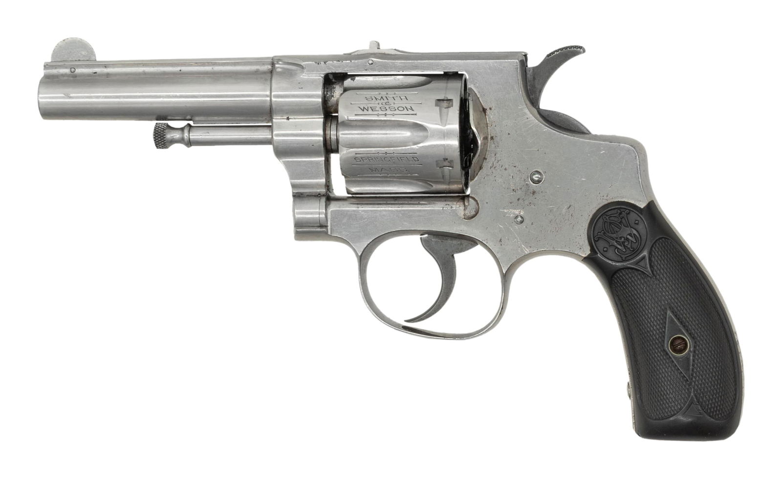 FIRST MODEL SMITH & WESSON 32 HE REVOLVER.: Cal. 32 S&W Long. S# 5488. Bbl. 3 1/4". Round blade front sight. Fixed u-notch rear sight. Matching numbers on frame, bbl. & cyl. Extractor number is illegible due to grease & oxidation. 6-shot cyl. E