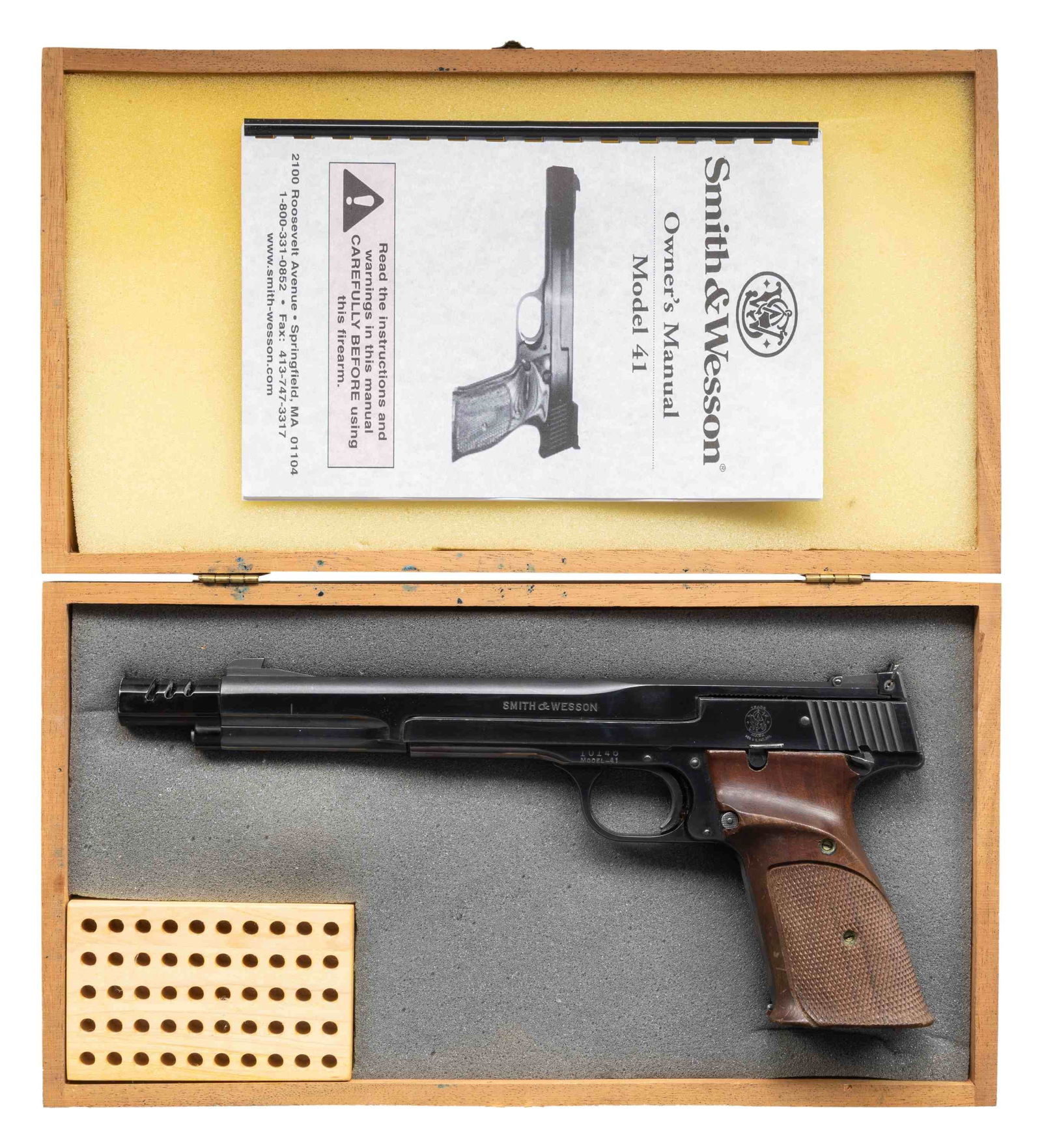 SMITH & WESSON MODEL 41 SEMI AUTO PISTOL.: Cal. 22 LR. S# 10146. Bbl. 7 3/8" with muzzle brake. Patridge front sight. Adjustable square notch rear sight. Mfr. prior to 1970 as indicated by lack of serial number prefix Blued finish. Checkered h