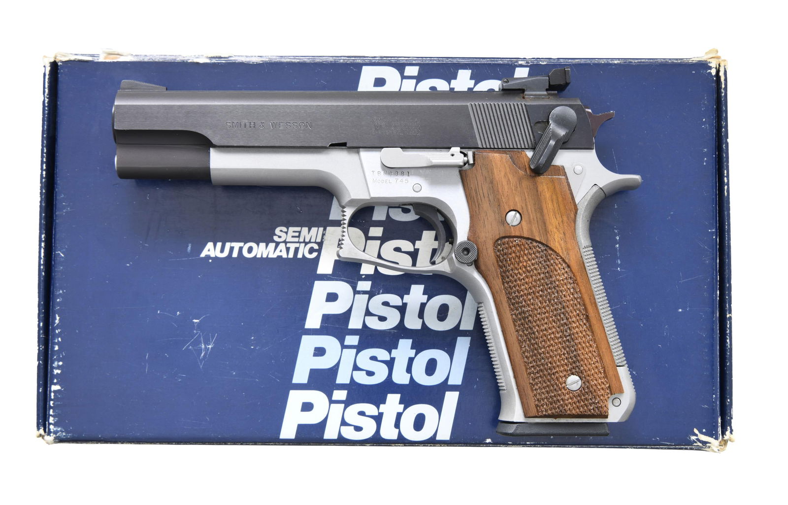 SMITH & WESSON MODEL 745 SEMI AUTO PISTOL.: Cal. 45 ACP. S# TBN3381. Bbl. 5". Ramped serrated blade front sight. Adjustable LPA rear sight that shows some dings around base. Single action semi auto target pistol. Right handed safety. Enlarged m