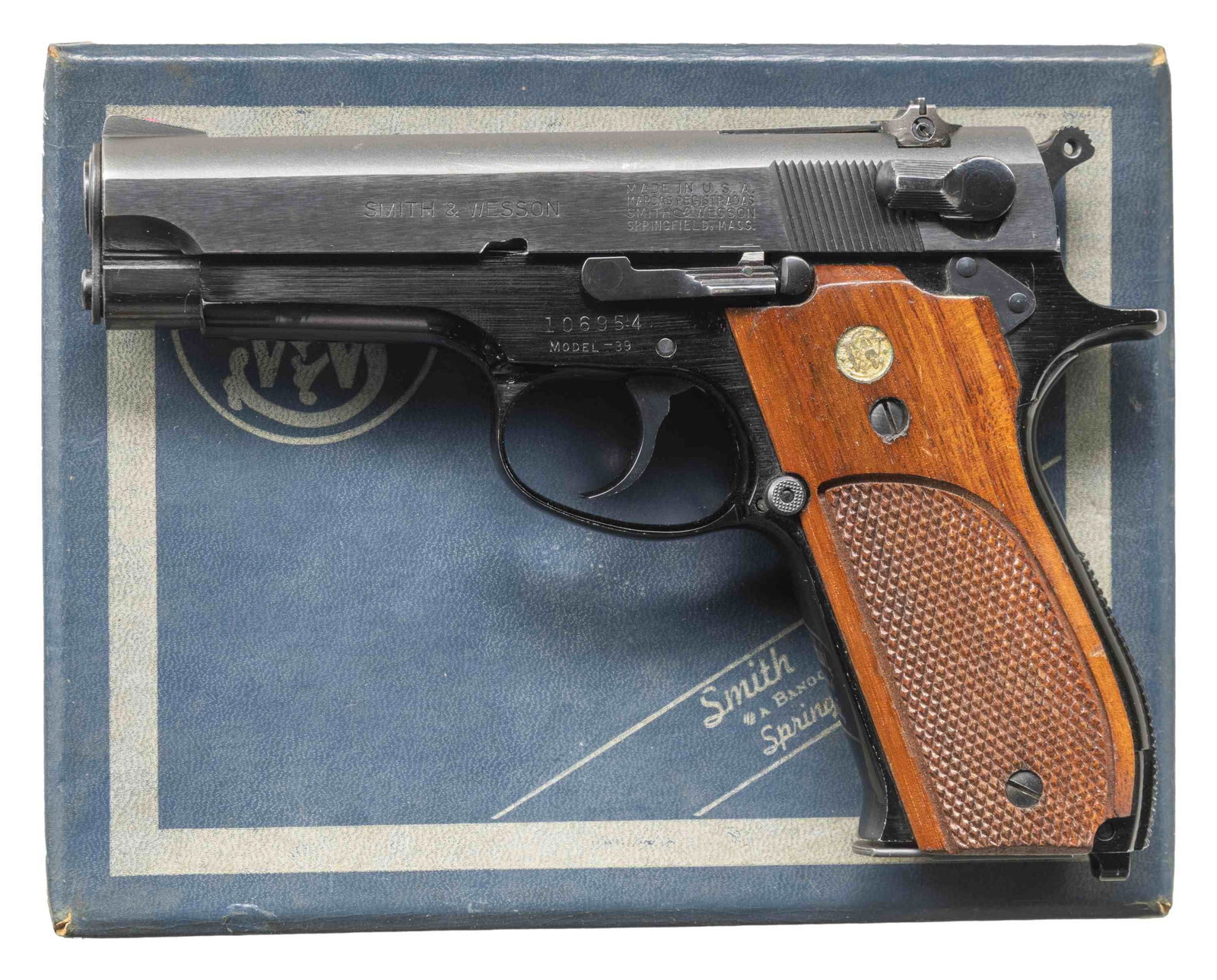 LOT OF 2 SMITH & WESSON MODEL 39 SEMI-AUTOMATIC: PISTOLS. Cal. 9mm Luger. S# 106954. Bbl. 4". Model 39 semi-automatic pistol mfg. by Smith & Wesson. Left side of the slide is marked "SMITH & WESSON", followed by S&W's mfg. information, with "PAT'S P