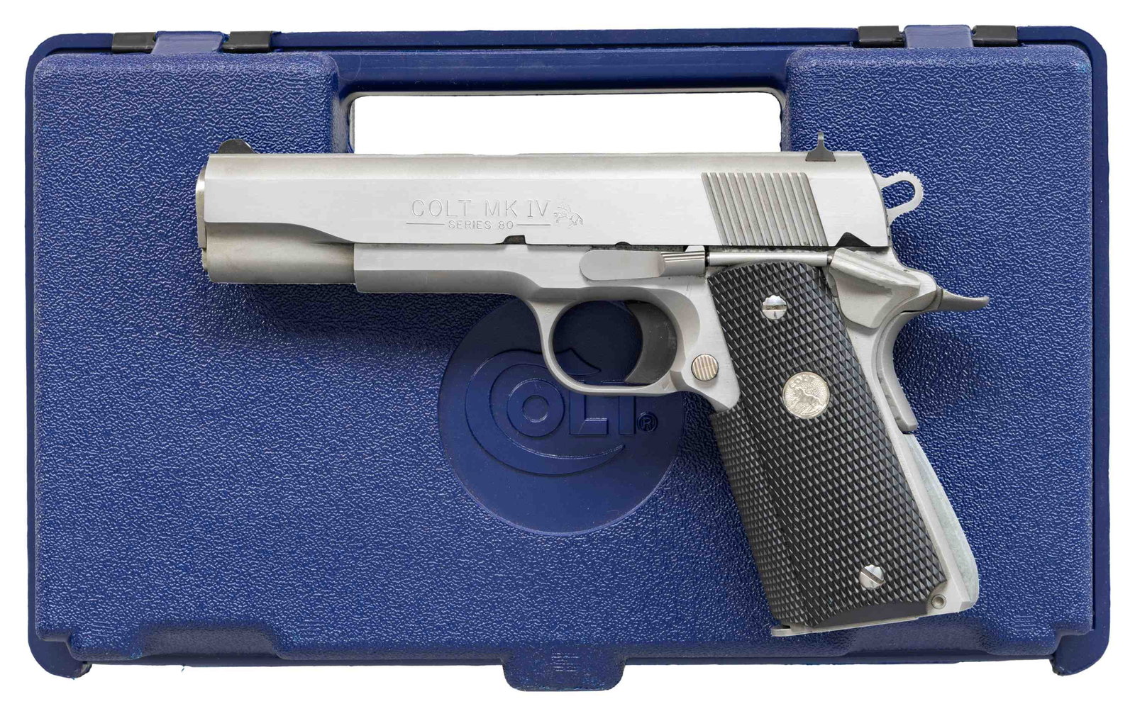 COLT GOVERNMENT MODEL MK IV SERIES 80 STAINLESS: SEMI AUTO PISTOL. Cal. 45 ACP. S# SS15821E (1995). Bbl. 5". 3 White dot sights. Stainless steel finish. Wrap around rubber Colt grips. MAGS: 2 Colt stainless 8 rd. & 2 Military blued 7 rd. UNATTTACHED