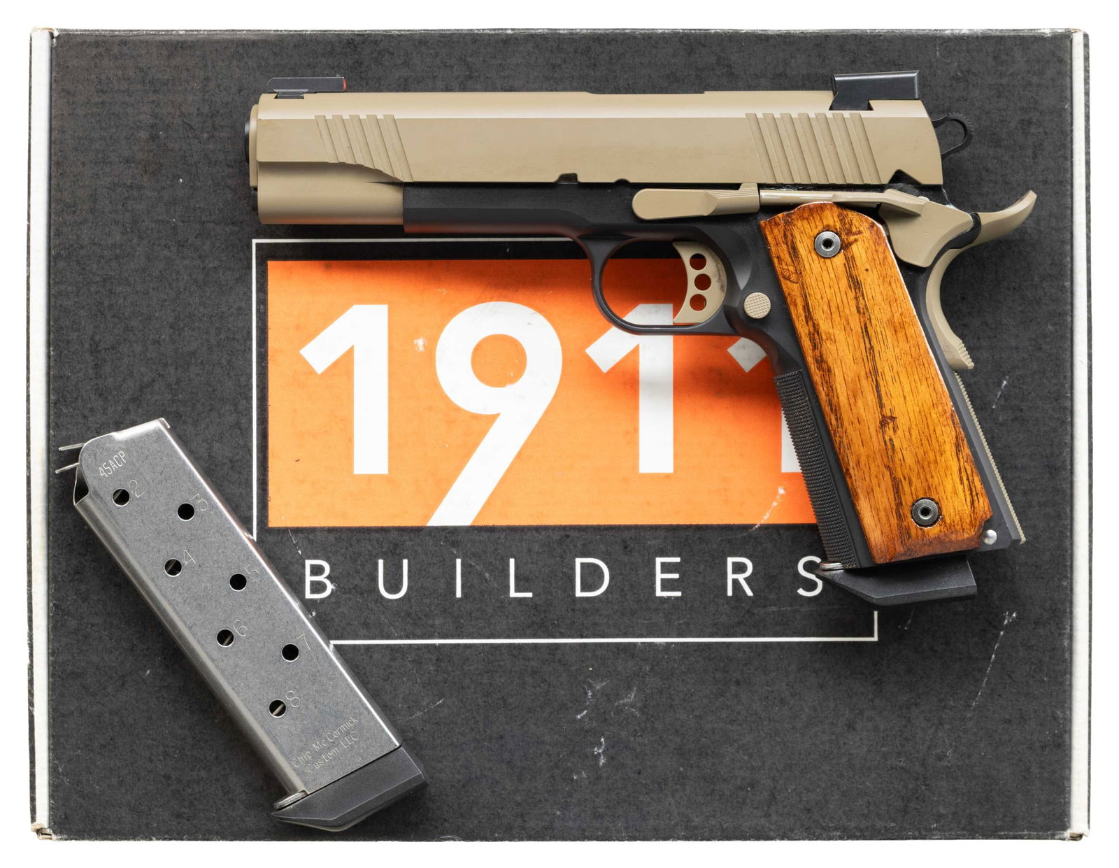 CUSTOM 1911 SEMI AUTO PISTOL.: Cal. 45 ACP. S# 2018-002/85212877-529. Bbl. 5". TG-H3 sights with u-notch rear. Custom 1911 Government style pistol. Extended right handed safety. Extended beavertail grip safety. Black frame marked "