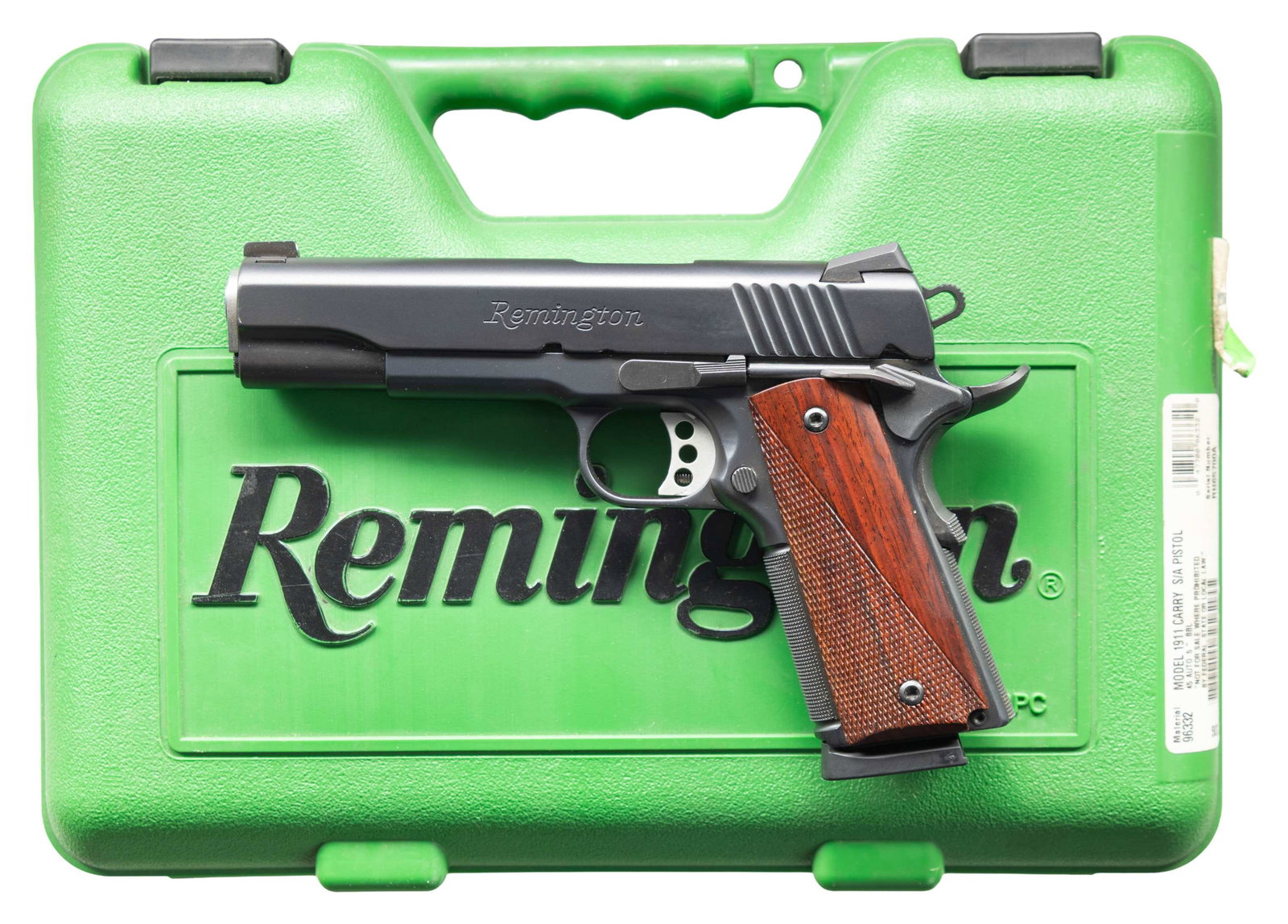REMINGTON 1911 R1 CARRY SEMI AUTO PISTOL.: Cal. 45 ACP. S# RH65700A. Bbl. 5". Tritium white dot front sight. Novak style rear sight. Extended ambi safety. Stippled grip straps. Extended beavertail grip safety. Matte blue finish. Checkered hard