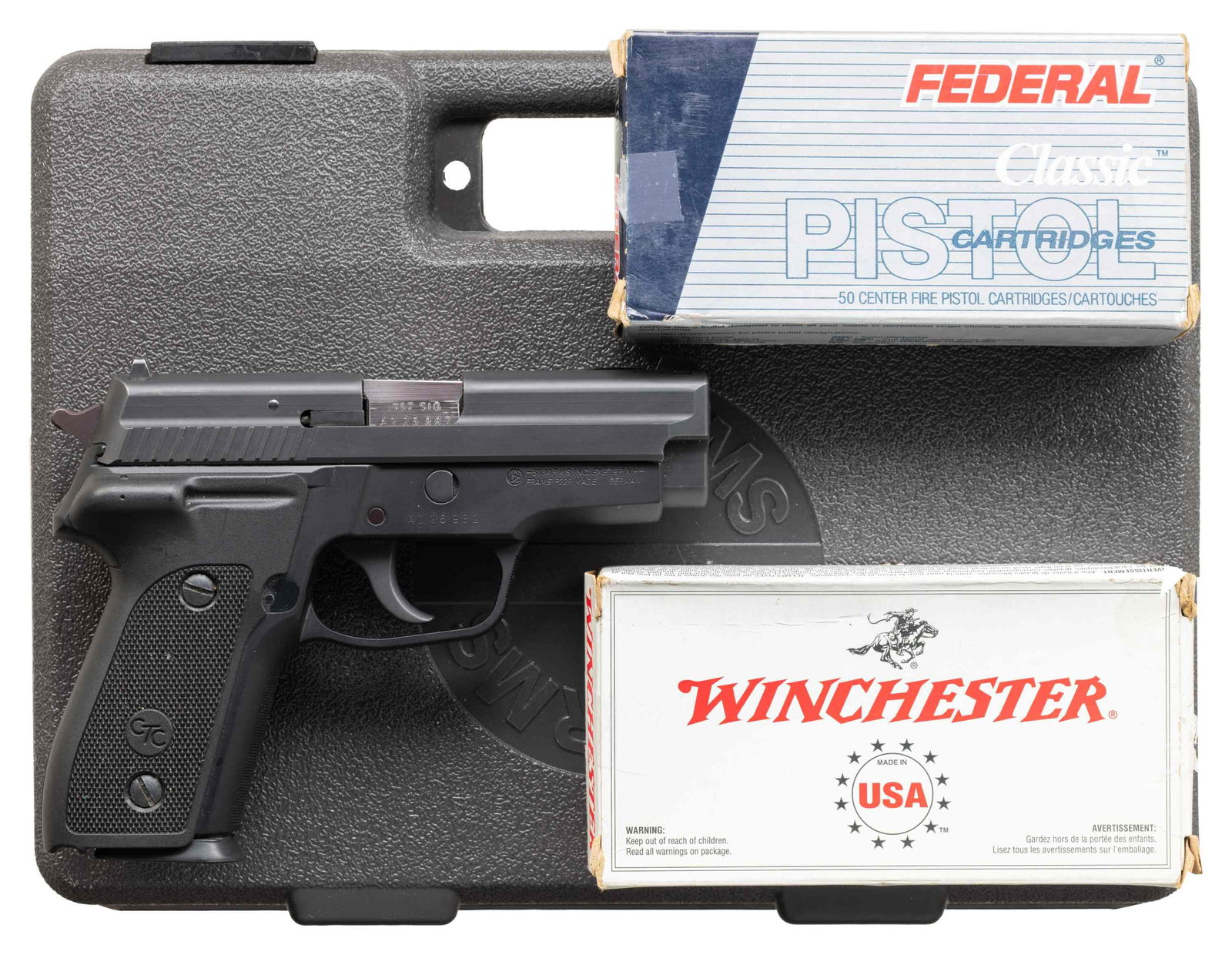 SIG SAUER P229 SEMI AUTO PISTOL.: Cal. 357 Sig. S# AD36982. Bbl. 3 7/8". White dot front sight. Square notch rear sight with white stripe. German made frame assembled in Exeter, NH. Slide has matte gray finish. Frame has matte black