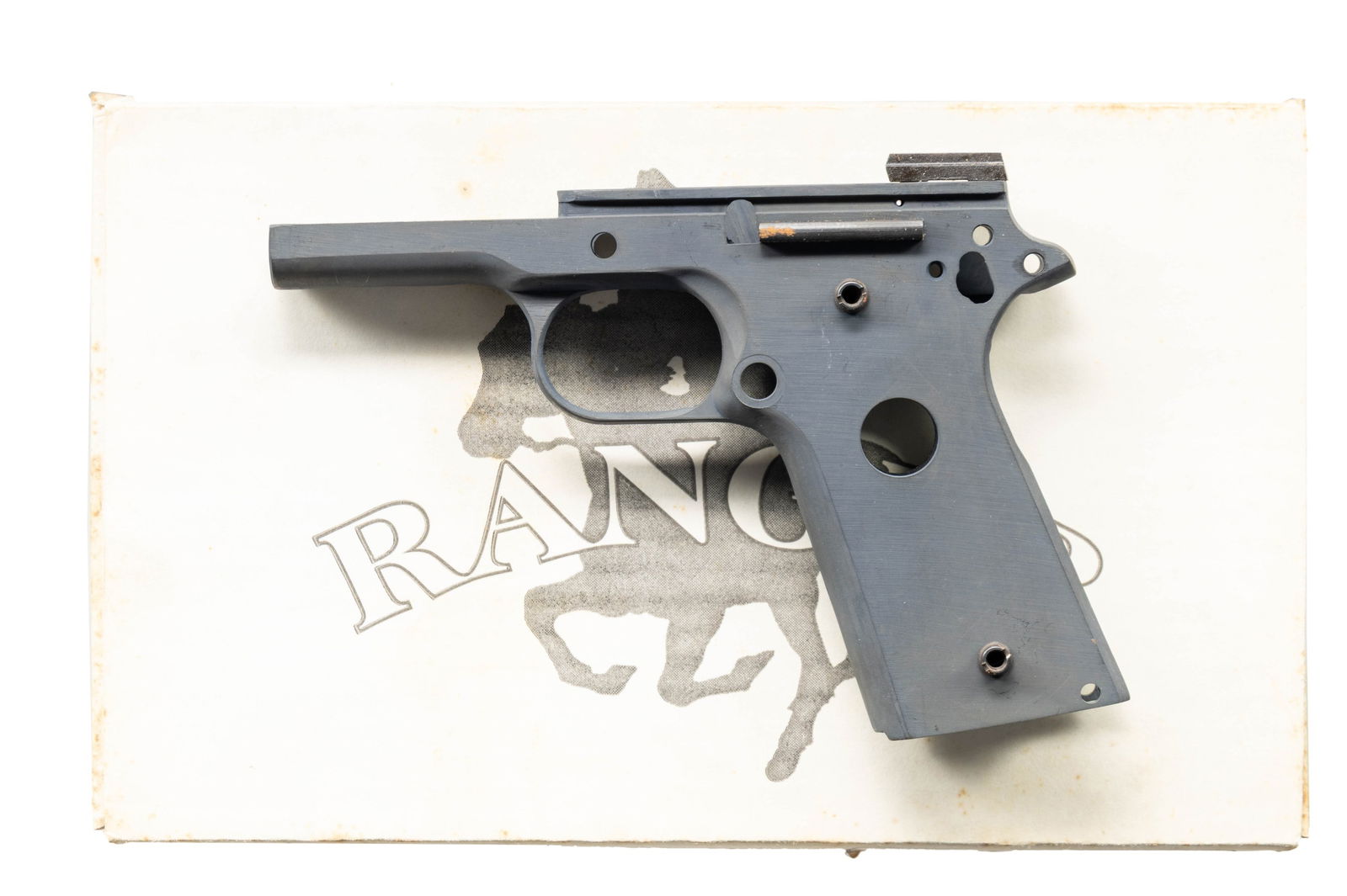 FEDERAL ORDNANCE 1911 FRAME.: S# F01662. Stripped federal ordnance 1911 frame. Finish appears to be parkerized. UNATTACHED ACCESSORIES: matching numbered Federal Ordnance Ranger box with mainspring. CONDITION: frame shows a spot