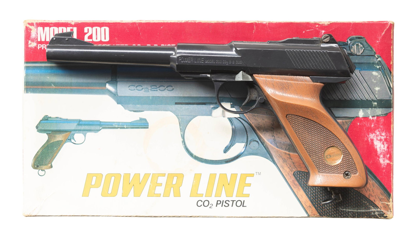 DAISY MODEL 200 CO2 BB PISTOL WITH BOX.: Cal. BB. S# C723968. Resembles the Colt Woodsman with 200 BB reservoir. UNATTACHED ACCESSORIES: factory box with papers. CONDITION: very good finish with minor handling marks. PROVENANCE: Norman Ollif