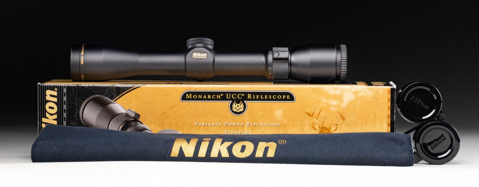 NIKON MONARCH UCC 2-7X32MM RIFLE SCOPE WITH: WITH FACTORY BOX. Monarch UCC 2-7x32mm (Item #: 6515) rifle scope mfg. by Nikon. Scope exhibits standard factory markings with a matte black finish. Complete with lens covers. UNATTACHED ACCESSORIES:
