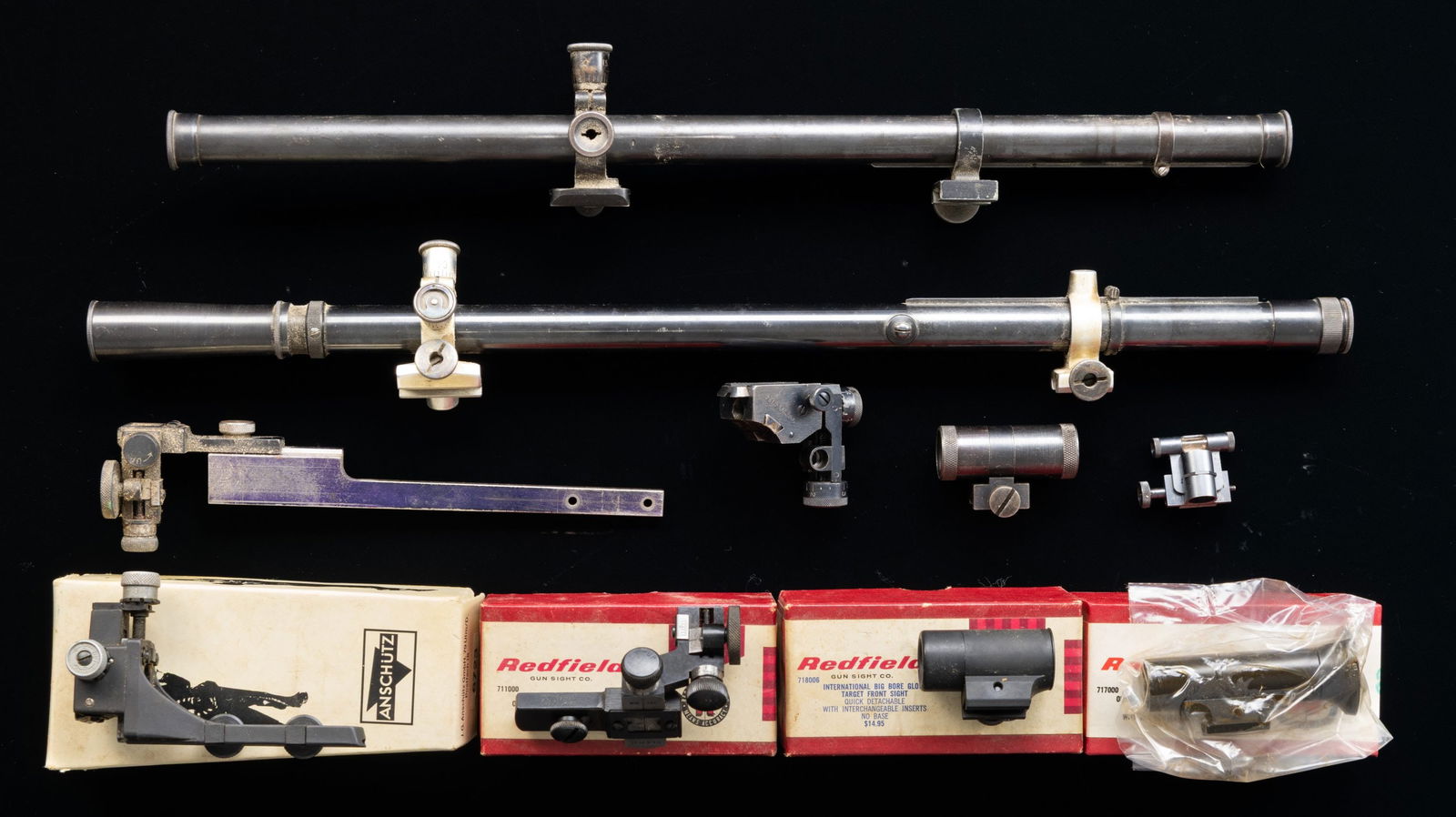 FECKER & LYMAN TUBE SCOPES ALONG WITH SIGHTS.: Lot includes:J. W. Fecker scope with S# 6724, External adjustments, screw on lens caps & Post-crosshair reticle. Scope has good finish with peppery oxidation; serviceable slightly cloudy optics.Lyman