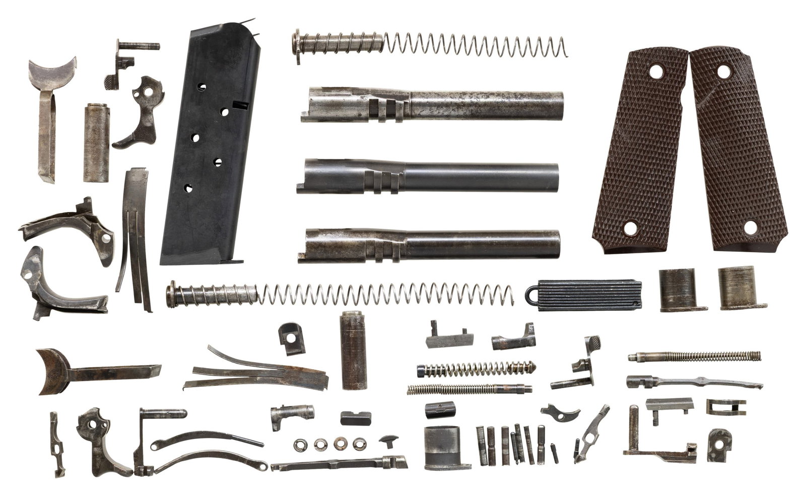 MODEL 1911 SMALL PARTS, BARRELS AND 1 MAGAZINE.: Possible occasional 1911-A1 parts mixed in, but generally 1911 parts. Overall condition of items varies from fair to good with poor bores in the barrels. Some items are refinished. PARTS: 3 barrels wi