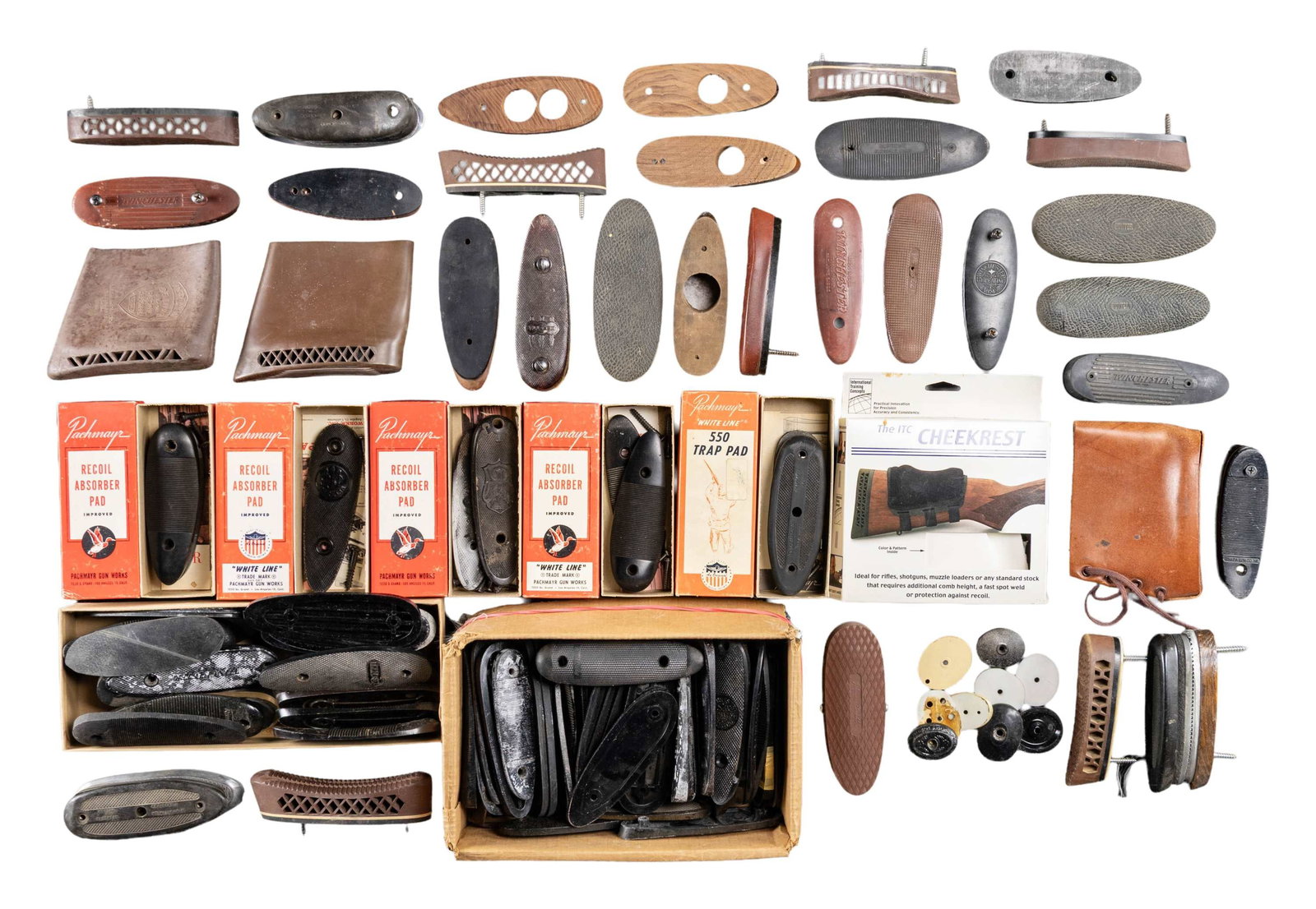 LARGE ASSORTMENT OF VARIOUS BUTTPLATE & BUTTPADS: Over 25 various ventilated & solid buttpads with some adjustable shims & wood filler.Over 55+ buttplates of various makers including Winchester, BRowning, Ithacagun, Bishop, etc. CONDITION: buttplates