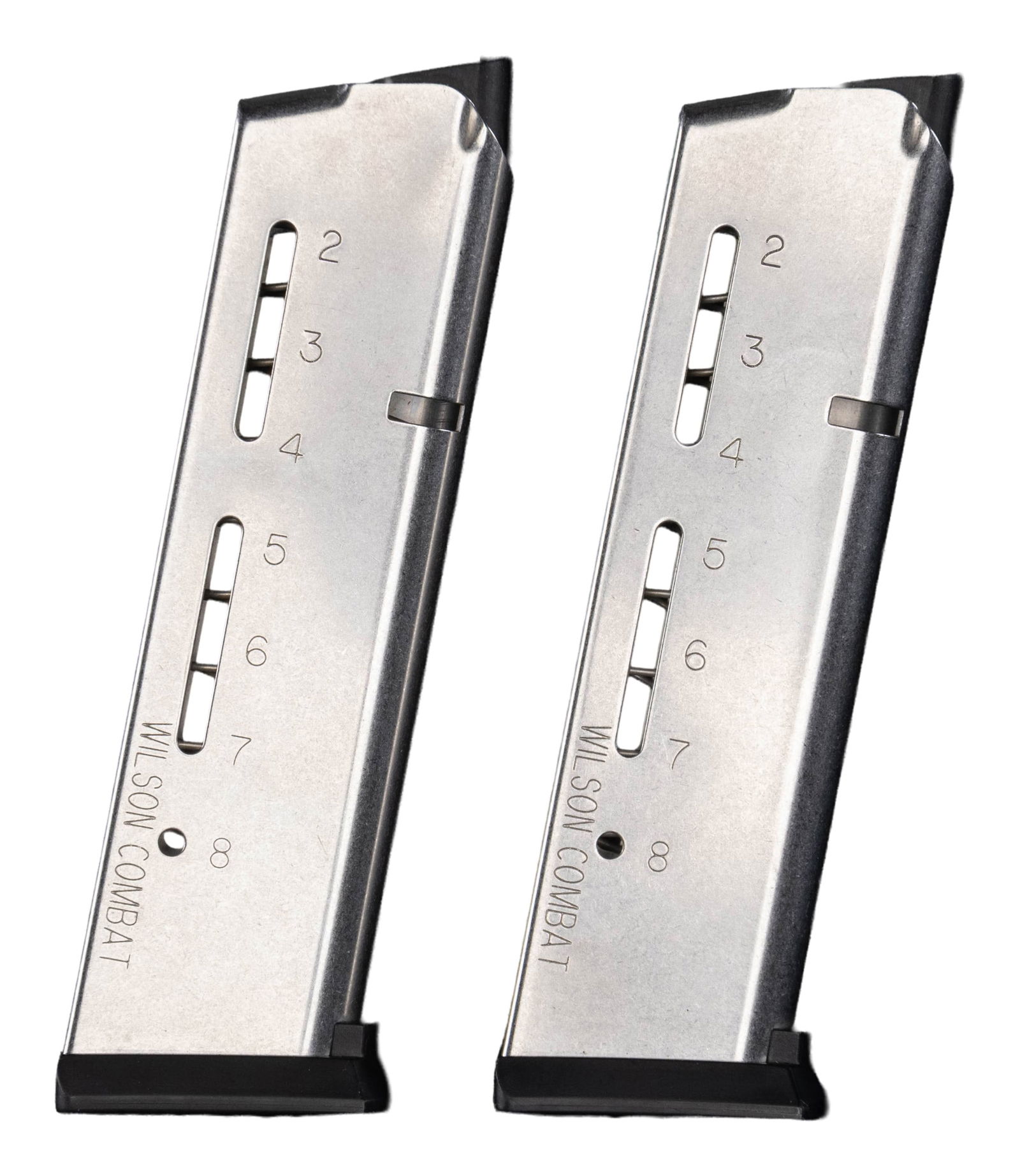 LOT OF TWO WILSON COMBAT 8 RD. 1911 MAGS.: Two stainless 8 rd. 45 ACP Wilson Combat 1911 mags. Stainless bodies with black followers & baseplates. CONDITION: very good plus with light wear. (02-26143/MJC). $40-60 for pair.