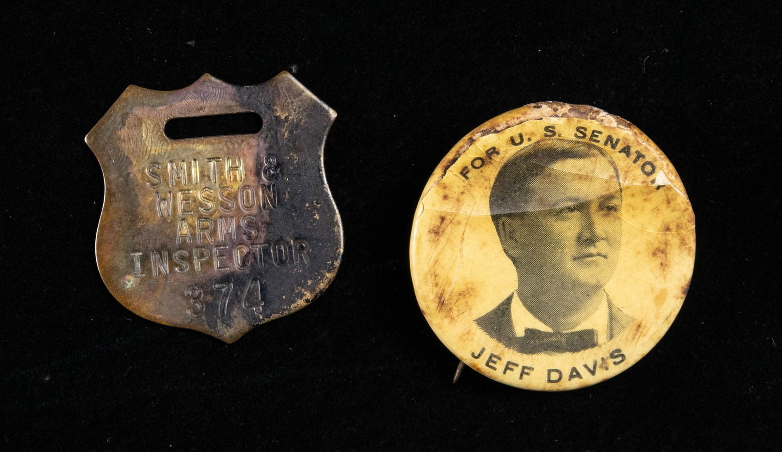 LOT OF 2 SMITH & WESSON INSPECTOR BADGE & U.S.: 1896 JEFF DAVIS U.S. SENATOR ELECTION PINBACK BUTTON. Lot consists of: 1) Small brass shield shaped badge marked "SMITH &/ WESSON/ ARMS/ INSPECTOR/ 374" on the front. CONDITION: badge remains sound, e