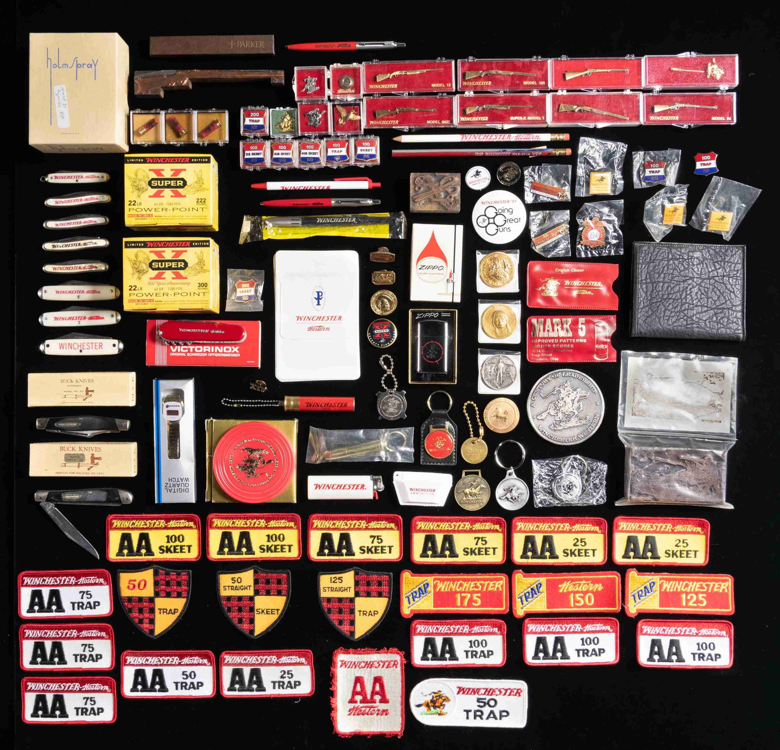 LARGE LOT OF ASSORTED WINCHESTER MEMORABILIA.: Large lot of assorted Winchester memorabilia, including: 1) x2 boxes (x1 222-rds., x1 300-rds., total 522-rds.) of Limited Edition Winchester 100th Anniversary .22 LR 40 grain Power-Point ammunition.