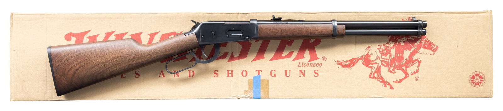 WINCHESTER 94 AE TRAPPER LEVER ACTION CARBINE.: Cal. 44 Mag. S# 6565220. Bbl. 16" rnd. Blade front sight. Adjustable sporting style rear sight. Receiver is factory drilled & tapped for scope mounting. Winchester 94 Angle Eject Trapper carbine.