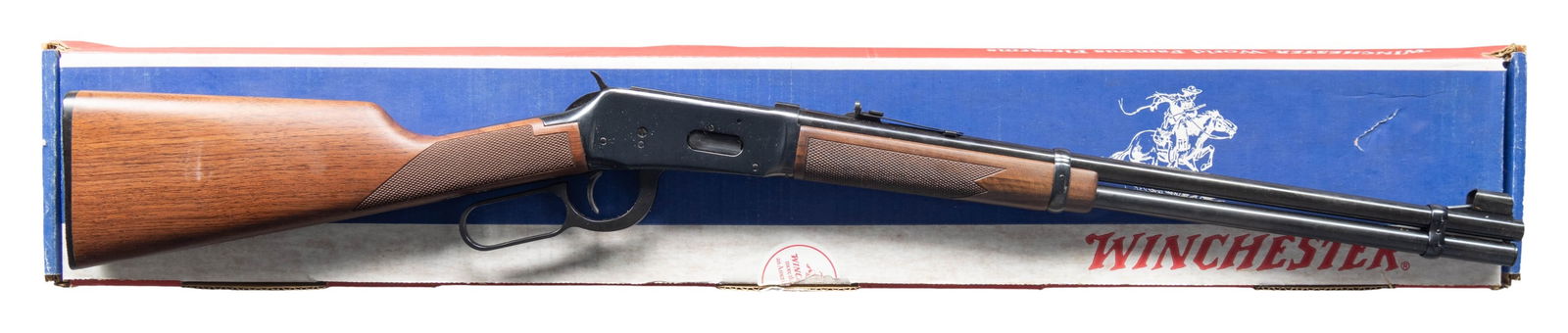 WINCHESTER 94 XTR LEVER ACTION CARBINE.: Cal. 30-30 Win. S# 4906155. Bbl. 20". Hooded bead front sight. Adjustable sporting style rear sight. Blued finish. Checkered walnut stock set. UNATTACHED ACCESSORIES: matching numbered factory box wit