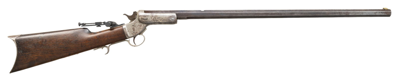 44 LONG CF J. STEVENS TIP-UP RIFLE.: Cal. 44 Long CF. S# 7555. Non-matching oct. 26" w/out forearm. Brass blade front sight, open rear dovetail & modern vernier tang sight. Nickel finished action w/ finger curl triggerguard; replacement