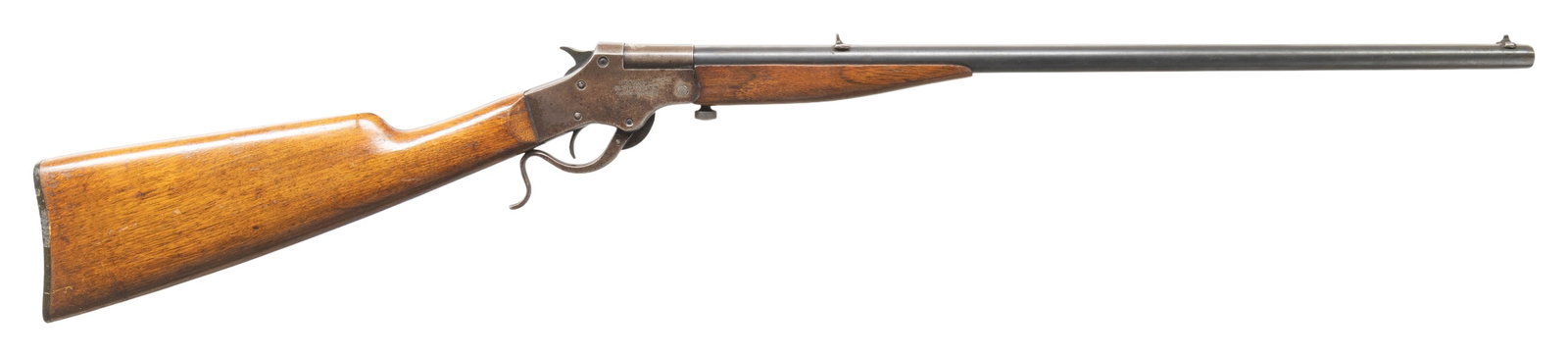 STEVENS MARKSMAN TIP UP RIFLE.: Cal. 25 Stevens. S# 25. Rnd. 22" w/ sporting sights. Walnut stock set. CONDITION: fair fading barrel blue with brown patina & pinprick oxidation. Action has gray patina with marks & spots of varnish.