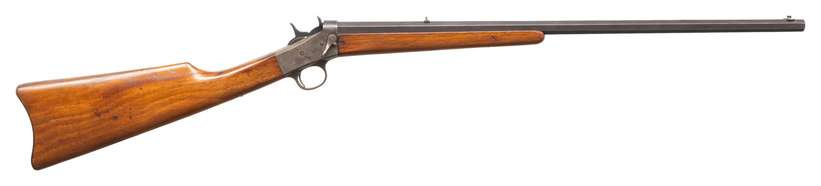REMINGTON NO. 4 ROLLING BLOCK RIMFIRE RIFLE.: Cal. 22 S, L, LR. S# 183426. Bbl. 22.5". Sporting sights. Takedown action. Walnut stock set w/ metal curved buttplate. CONDITION: fair fading barrel blue mixing with brown patina showing scattered