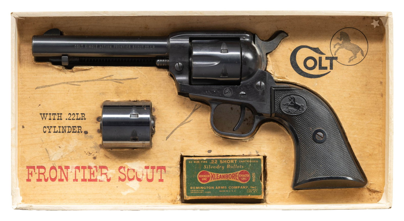 COLT FRONTIER SCOUT SINGLE ACTION REVOLVER WITH: FACTORY BOX. Cal. 22 LR. S# 106366F. Bbl. 4 3/4". Frontier Scout single action revolver mfg. by Colt in 1960. Left side of the bbl. is marked with the model and cal. designations, with Colt's single