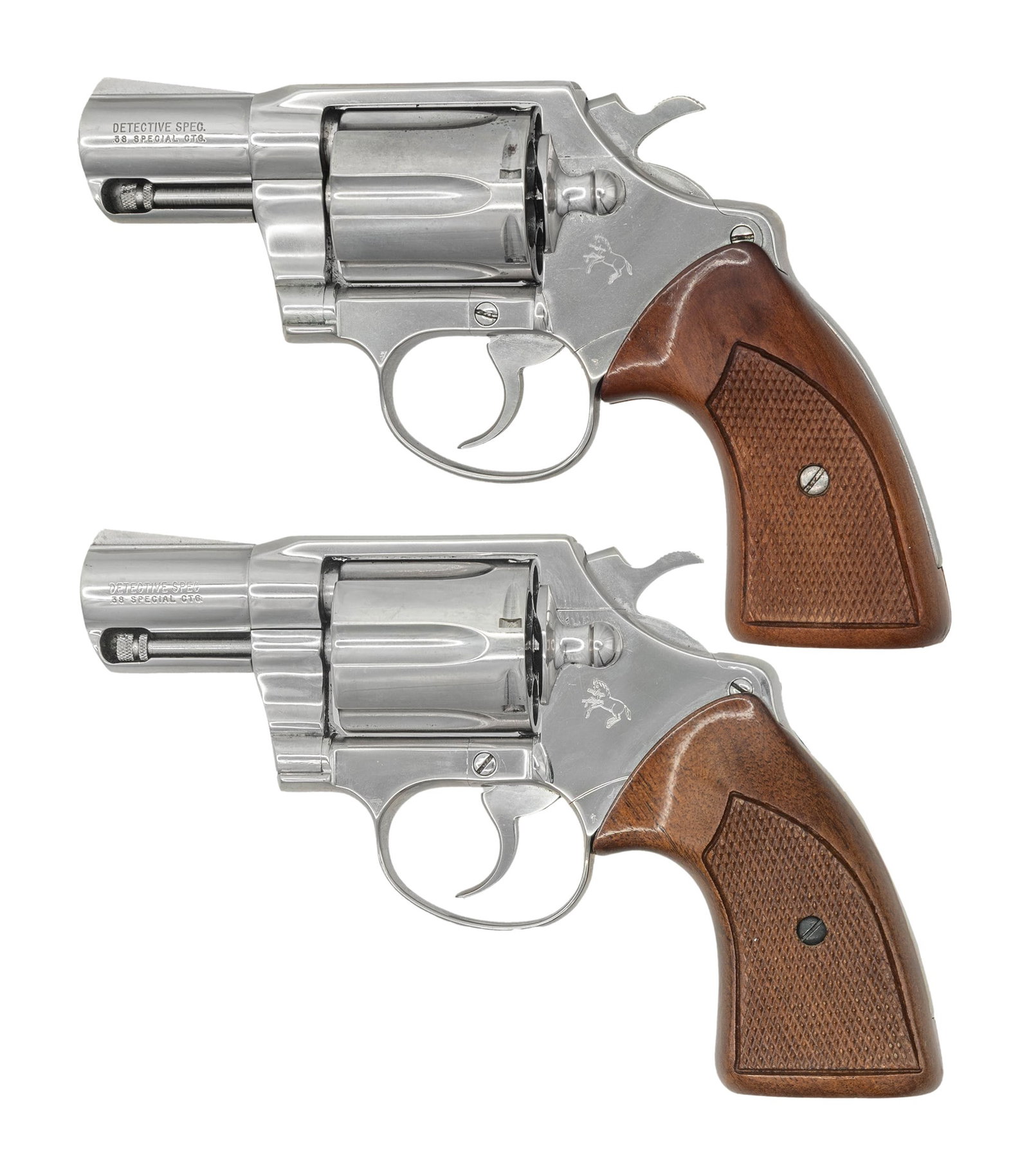 PAIR OF NICKEL PLATED COLT DETECTIVE SPECIAL: DOUBLE ACTION REVOLVERS. 1) COLT DETECTIVE SPECIAL DOUBLE ACTION REVOLVER. Cal. 38 Spcl. S# H17183. Bbl. 2 1/8". Detective Special double action revolver mfg. by Colt in 1974. Left side of the bbl. is