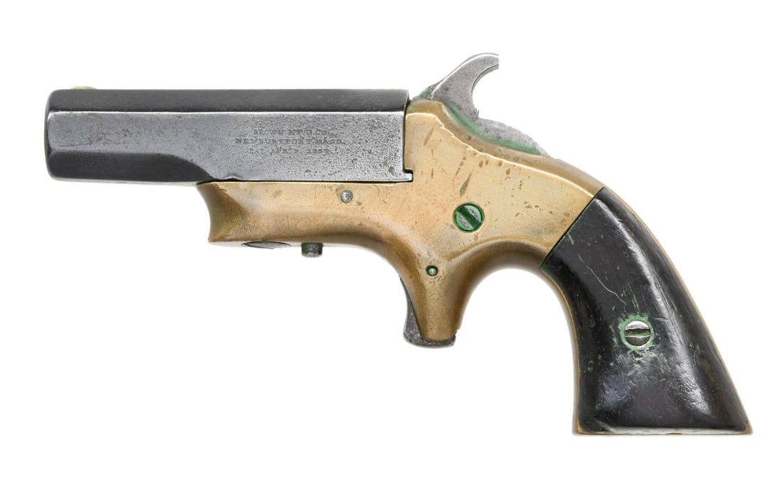 BROWN MFG CO. SOUTHERNER DERRINGER PISTOL.: Cal. 41 RF. S# 1043. Bbl 2 1/2". Southerner derringer manufactured by Browning Manufacturing Company. Brass frame with 2 piece smooth wood grips. Barrel has been reblued. Matching numbers are present