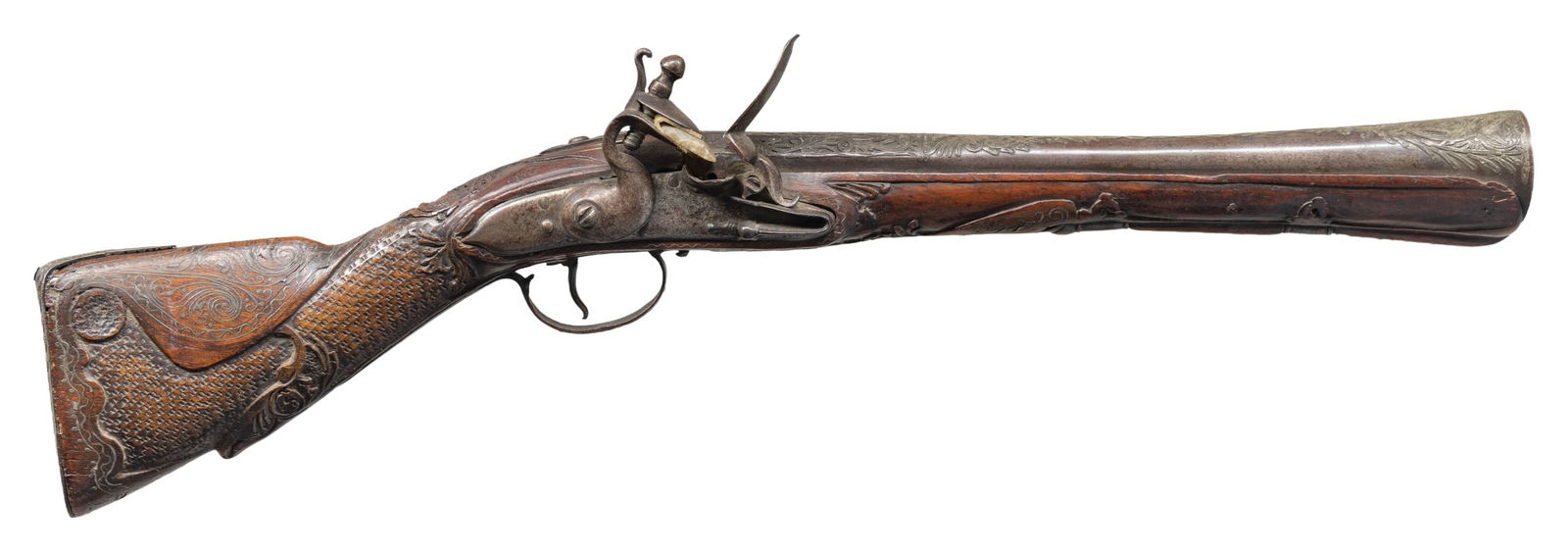 ATTRACTIVE, LIKELY EASTERN EUROPEAN, DIMINUTIVE: FLINTLOCK BLUNDERBUSS. Cal. 1 3/8" (at flared muzzle). NSN. Bbl. 12". Flintlock blunderbuss likely of Eastern European origin. Lockplate features light vine type scroll engraving. Bbl. features a face