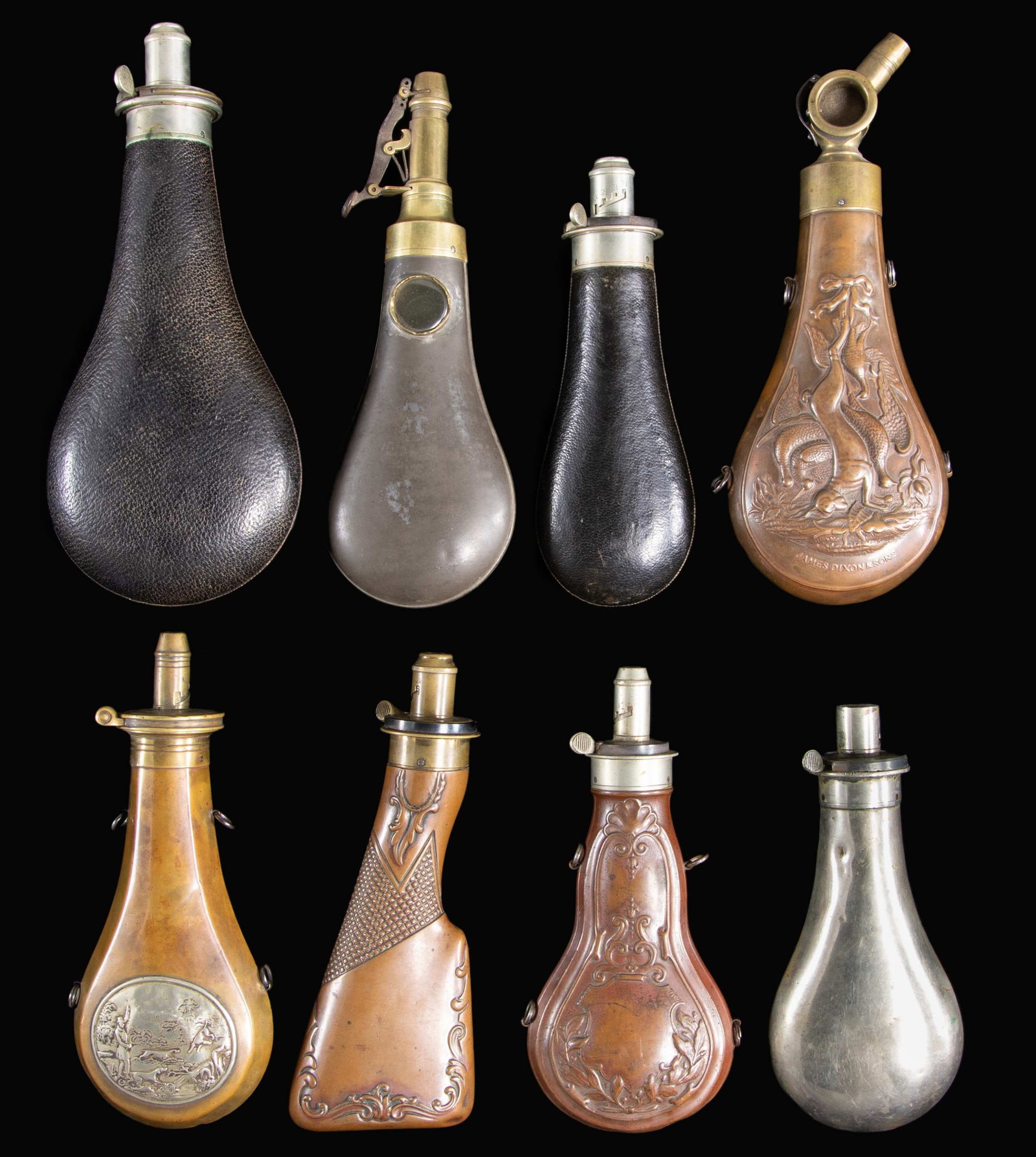 FINE GROUP OF 8 JAMES DIXON RIFLE & SHOTGUN: POWDER FLASKS. 9" embossed design with patent charger with glass windows and rotating top, 9" tin flask with 2 glass windows & patent powder measure charger, 8" embossed rifle stock, 8.5" with