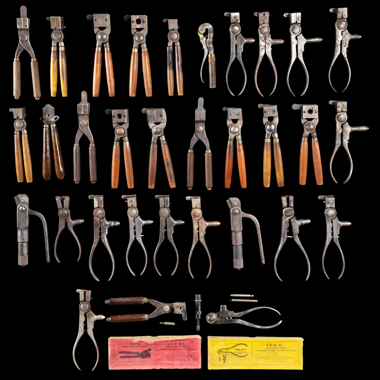 31 PRIMARILY LYMAN RELOADING TOOLS & BULLET MOLDS.: 14 Lyman Reloading tools: (2) No. 4 cal. 25-20 R(2) No. 4 cal. 25-20 SS(1) No. 4 cal. 32-20(3) No. 4 cal. 32 S&W(1) No. 4 cal. 32 L R(1) No. 4 cal. 38-40(1) No. 4 cal. 45 COLT(1) No. 4 cal. 38 EX