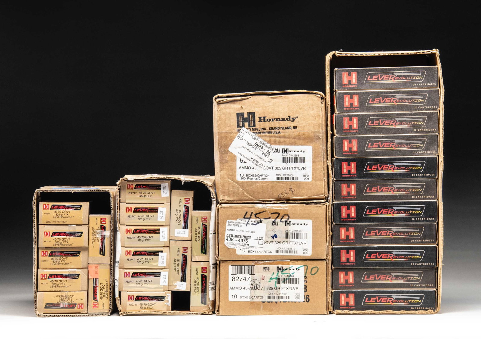 ABOUT 1160 RDS. OF HORNADY 45-70 AMMO.: Fifty eight 20 rd. boxes of Hornady Leverevolution 45-70 Ammo. Ammo is in boxes & some further housed in shipping boxes. CONDITION: boxes showing varying degrees of wear. Most of ammo is sealed in fac