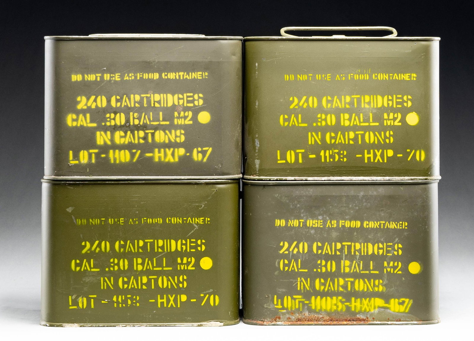 4 SEALED CANS (240 RDS. EACH) OF US M2 BALL AMMO.: Sealed cans with carry handles. 2 are dated "67" and 2 are dated "70"; all marked "in cartons". Very good exterior appearance. Intended for Garand use. (02-25027-1/NW). $750-1,000.