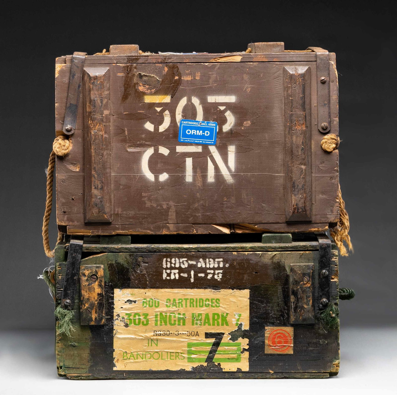 1,273 ROUNDS OF 303 BRITISH BALL AMMO.: All very good serviceable ammo of post war production. Crate containing 2 "Spam" cans of 300 rounds each containing 50 round bandoliers having ammo on 5 round stripper clips. One bandolier missing fro