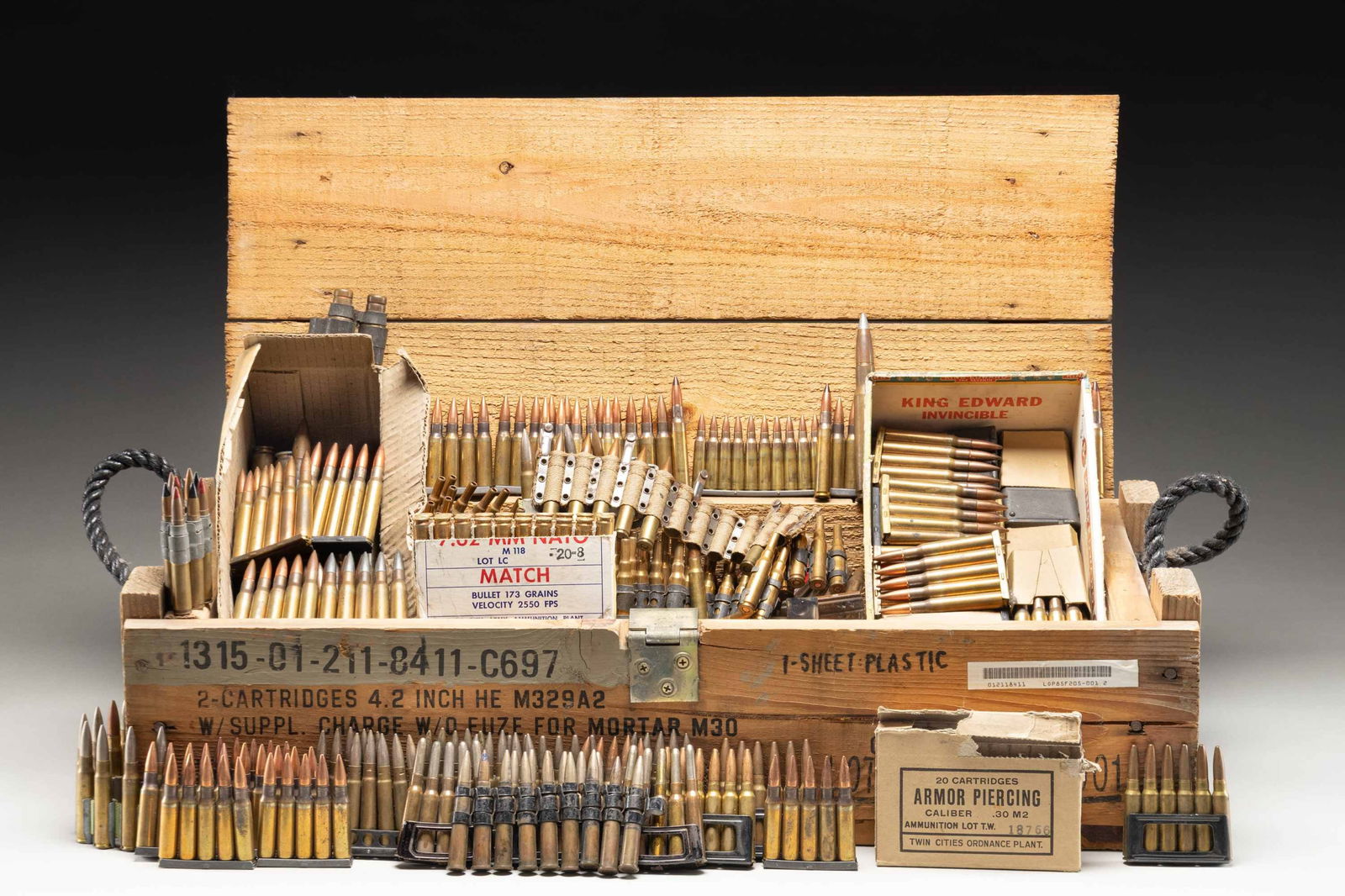LOT OF ASSORTED MILITARY CALIBER AMMUNITION WITH: U.S. M329A2 4.2" MORTAR ROUND CRATE. Lot of assorted military caliber ammunition, including: 1) x5 6-rd. stripper clips (30-rds. total) of 7.35x51mm Carcano ammunition. 2) x2 20-rd. Breda Model 30 cli