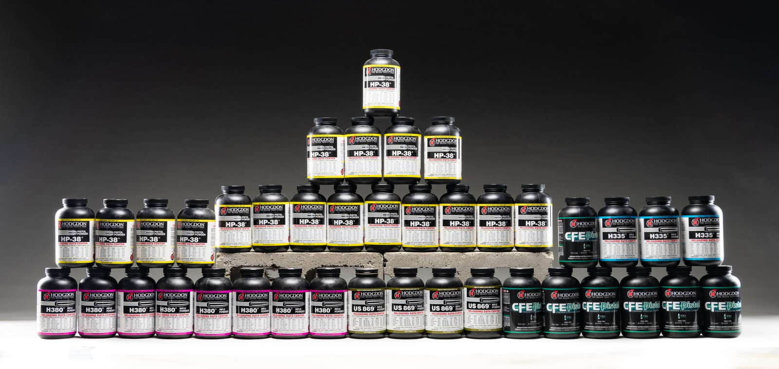 HODGDON RIFLE & PISTOL SMOKELESS POWDER.: Within this lot is 40 - 1 lb. containers:18 of HP-38 for Pistols.7 of CFE for Pistols.8 of H380 for Rifles.3 of H335 for Rifles.4 of US869 for Rifles. CONDITION: all containers appear as new with reta