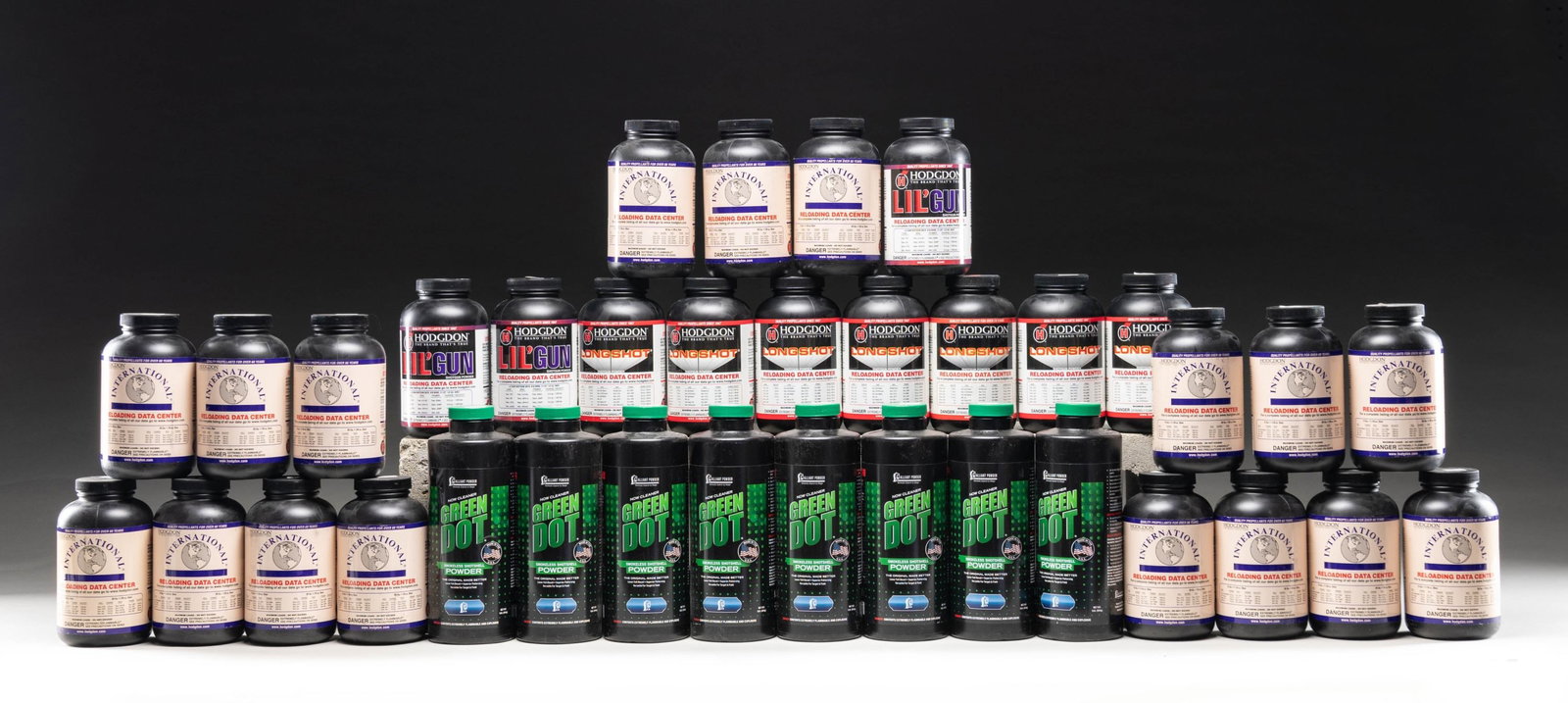 HODGDON & ALLIANT SMOKELESS SHOT SHELL POWDER.: HODGDON:17 - 14 oz. International for 12 Ga. & 20 Ga.7 - 1 lb. Longshot.3 - 1 lb. Lil' Gun.ALLIANT: 8 - 1 lb. Greendot. CONDITION: all containers appear as new with retailer sticks & sealed under lids