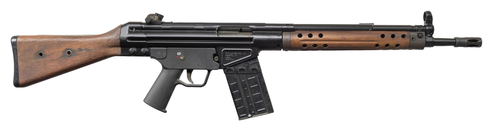 PTR INDUSTRIES CETME SEMI AUTO RIFLE.: Cal. 308 Win. S# AW16846. Bbl 18" over A2 bird cage flash hider. Hooded post front sight. Drum adj rear sight. Walnut stock. HK style trigger pack. Green web sling. MAGS: 2 20rd. with green molded
