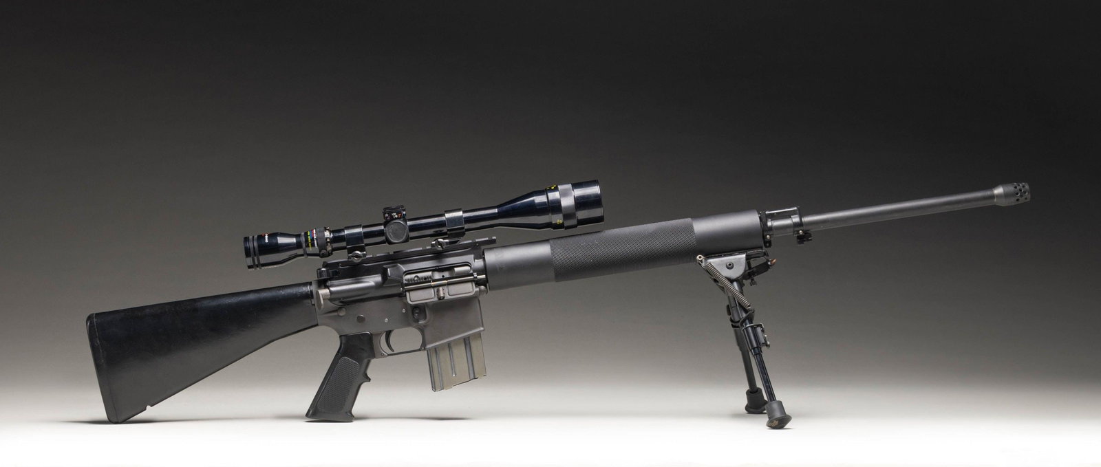 CUSTOM E.A. CO. J-15 SEMI-AUTOMATIC RIFLE.: Cal. 223. S# EA036863. Bbl. 23 1/2". Pre-Ban J-15 semi-automatic rifle receiver mfg. by E.A. Co. Left side of the cast receiver is marked with raised characters denoting the model and cal.