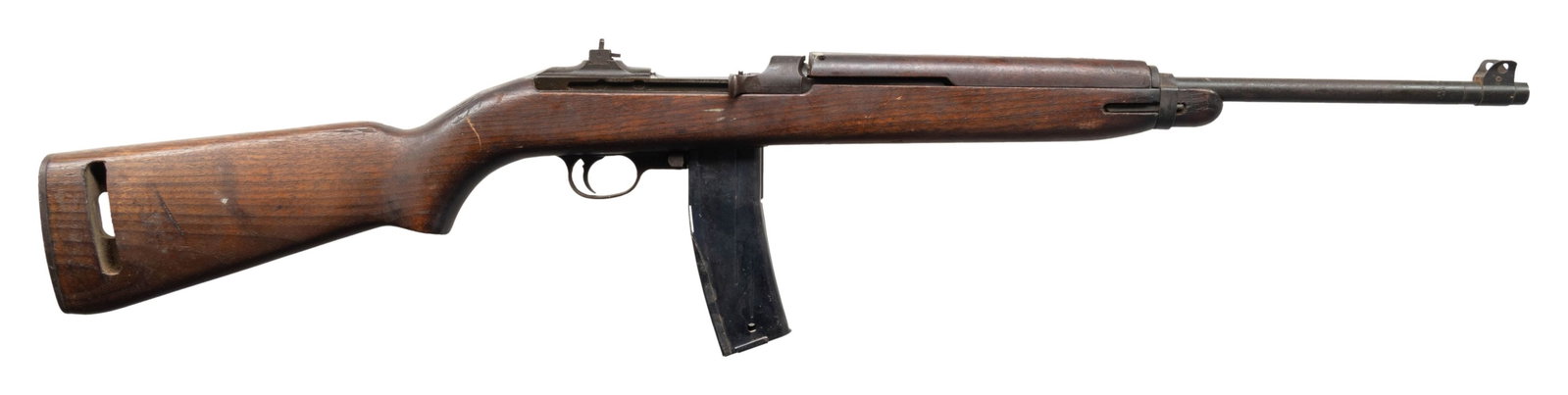 U.S. WWII INLAND M1 SEMI-AUTO MILITARY CARBINE.: Cal. 30 Carbine. S# 889028. Bbl. 18". Barrel is marked behind front sight "INLAND MFG. DIV. / GENERAL MOTORS / 10-43". Narrow barrel band is unmarked. Flip type aperture rear sight. Blade front sight 