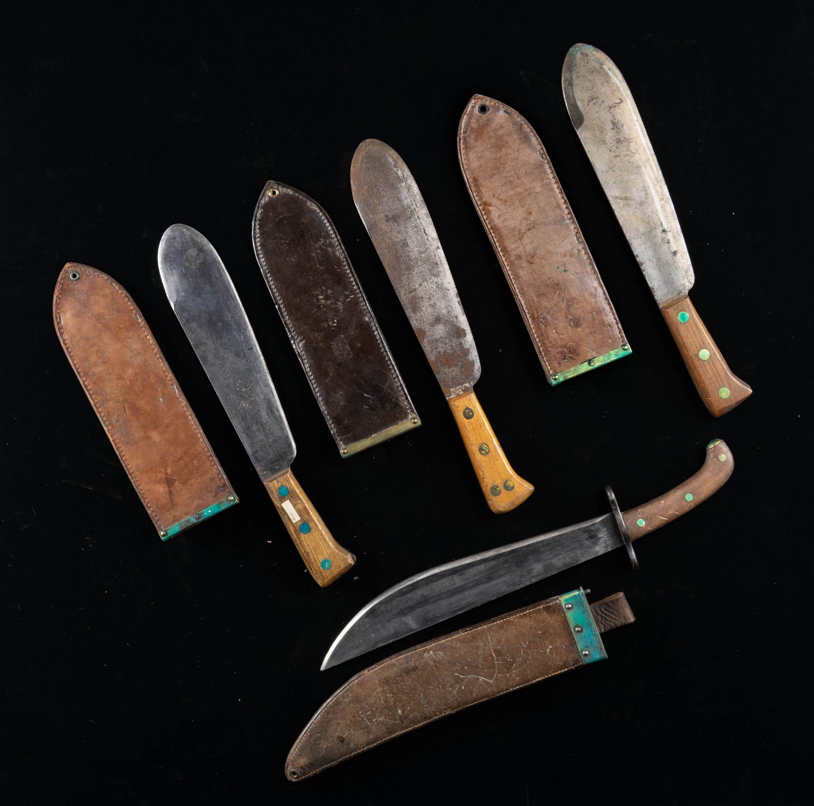 3 USMC CORPSMAN KNIVES & 1 US M1909 BOLO KNIFE.: 1) USMC medical corpsman knife marked "U.S.M.C. CHATILLON, N.Y." on the flat of the blade. The brown leather scabbard is marked on the reverse "USMC BOYT 44". 2) USMC medical corpsman knife marked