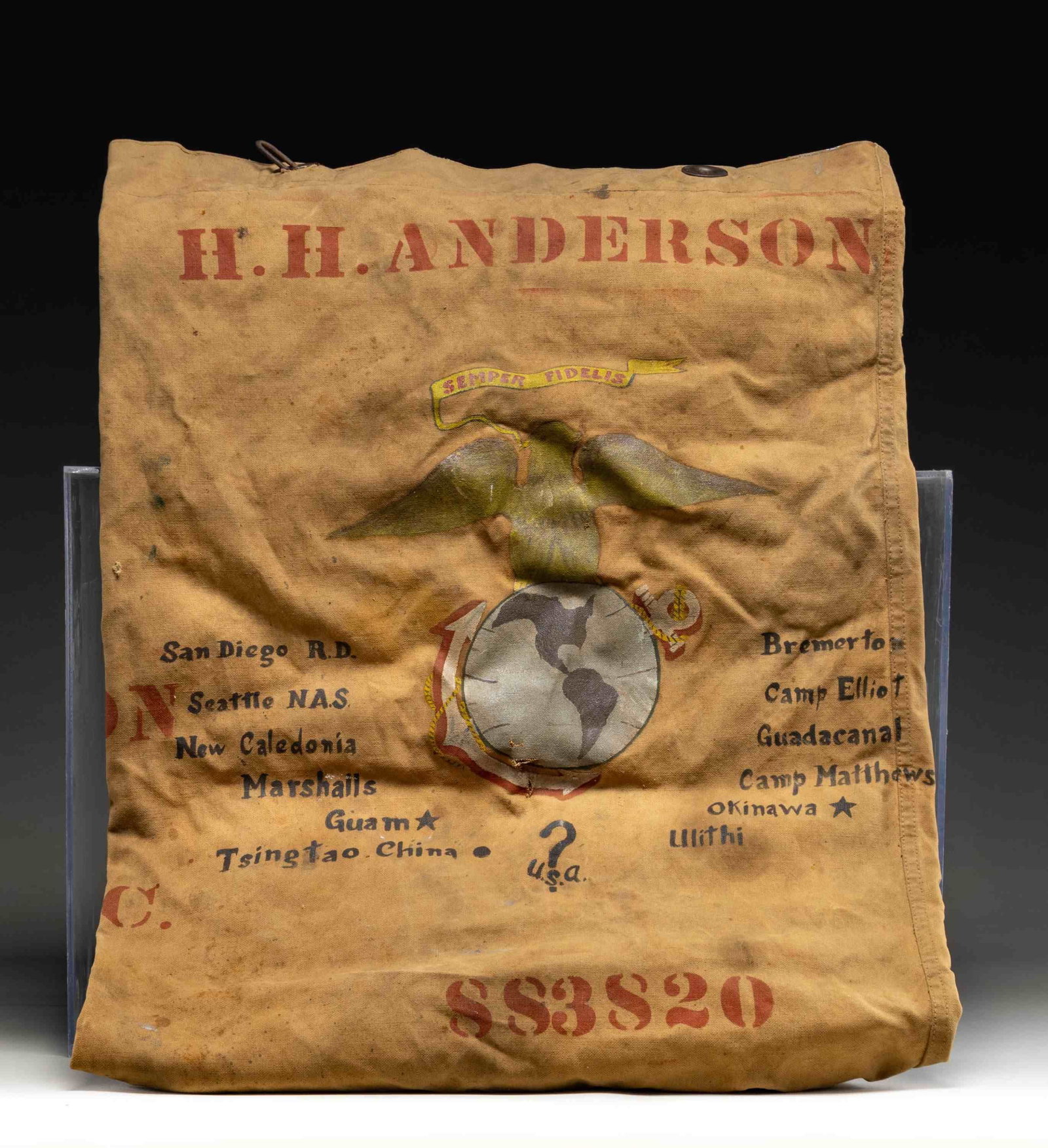 NAMED WW2 USMC SEA BAG.: WW2 USMC Sea Bag with 6th Marine Divsion logo, USMC emblem & the names of several locations notably Guadalcanal, Okinawa & Tsingtao. Bag has name of "H.H. ANDERSON" with Chicago street address.