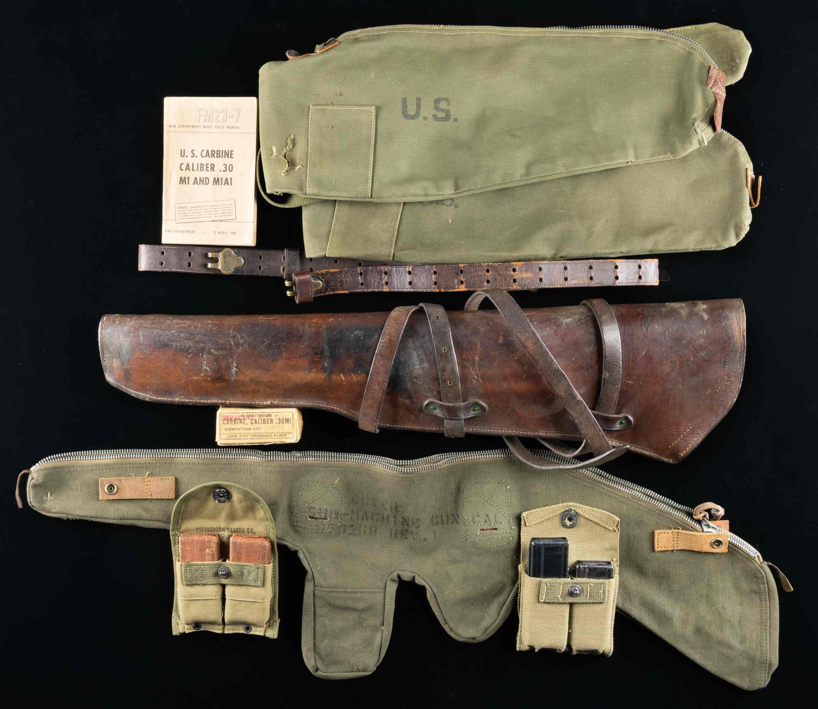 US MILITARIA GROUPING INCLUDING AMMO, MAGAZINES,: & SCABBARDS.1) 50rds LAKE VITY 30 CARBINE AMMO. CONDITION: light tearing and fraying in the corners.2) USMC WEB MAG POUCH BY BOYT. Includes 2-15rd carbine mags.3) PITTSBURGH GARTER WEB MAG POUCH.