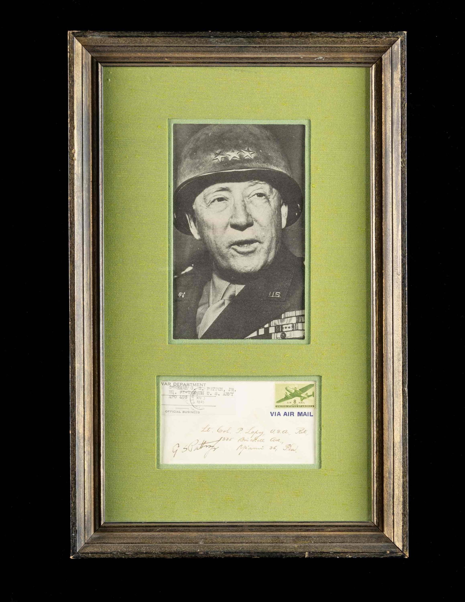 GEORGE S. PATTON SIGNED ENVELOPE POSTED 6 WEEKS: BEFORE HIS DEATH.This lot contains a 19" x 12" frame with a signed envelope by George S. Patton to a Lt. Col. Ret. residing in Miami FL from Patton at the HQ of the 15th Army. The frame also includes