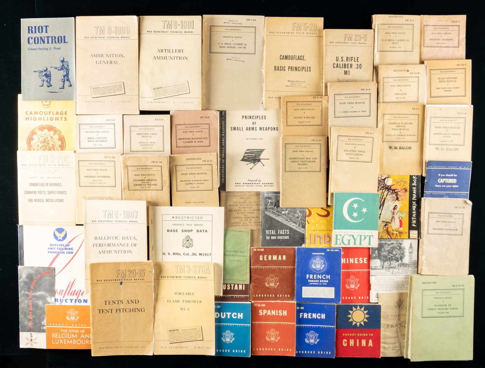 LARGE GROUPING OF WWII US TECH & TRAINING MANUALS.: This is grouping of War Department manuals are all WWII (including pre-WWII). There are language, equipment, weapon, fact sheets & procedure manuals and guides. CONDITION: overall good with some stain