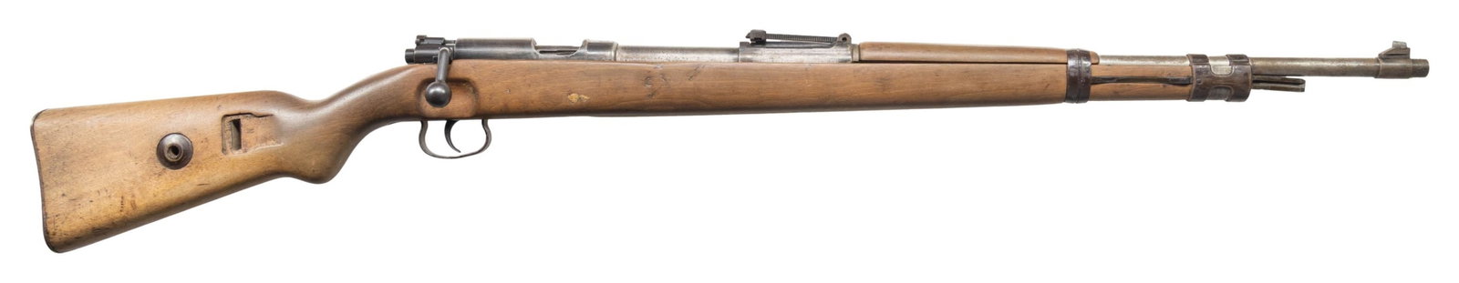 MAUSER KK-WEHRSPORTSGEWEHR SINGLE SHOT BOLT ACTION: RIFLE. Cal. 22 LR. S# 4469. Bbl. 25 3/4". KK-Wehrsportgewehr (KKW) single shot bolt action rifle mfg. by Mauser. Left side of the bbl. is marked "KAL. 22 LANG FUR BUCHSEN 4469", followed by an