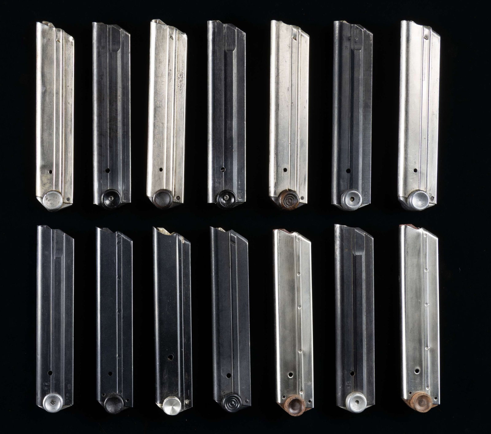 LOT OF 14 ASSORTED LUGER MAGAZINES.: Lot of 14 assorted Luger mags., including: 1) x1 plated 8-rd. mag. with concentric wood plug marked with a mostly illegible S#, appearing to read "3075". 2) x1 plated 8-rd. mag. with renumbered wood