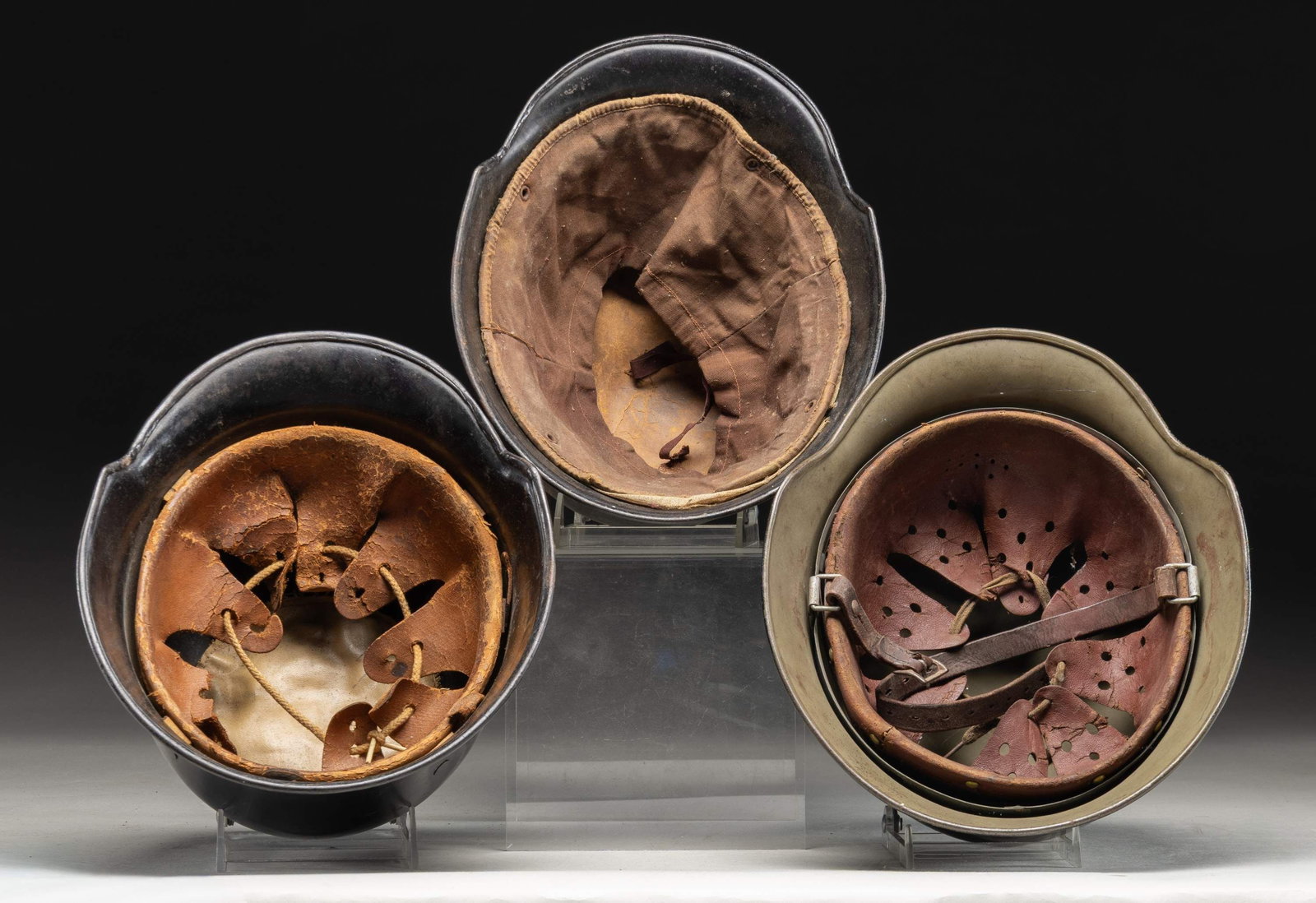 3 WWII GERMAN HELMETS. - 3