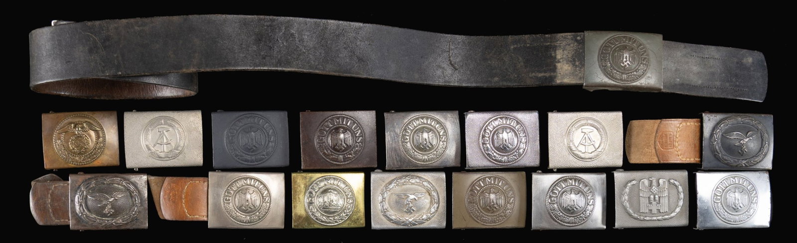 17 GERMAN BELT BUCKLES.: (1) 2nd Pattern Heer Enlisted w/ stippling. (5) 2nd Pattern Heer Enlisted. (1) Field Grey Heer Enlisted (B&N - 43). (1) Olive Drab Heer Enlisted. (1) Olive Drab Heer Enlisted w/ belt. (1) 1st Patern L