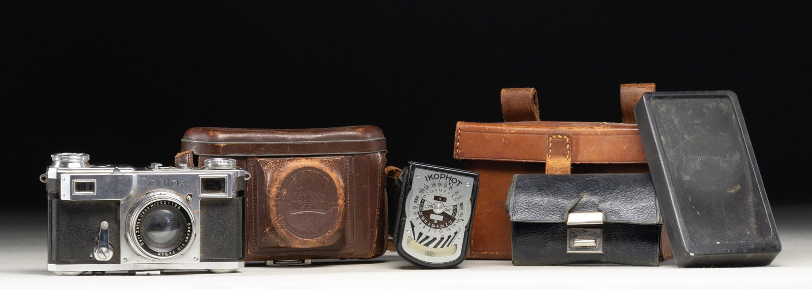 WWII GERMAN GEHEIME STAATPOLIZEI CARL ZEISS CONTAX: RANGEFINDER 35mm CAMERA & ACCESSORIES. This camera was utilized by the Geheime Staatpolizei, the secret state police or Gestapo of WWII Germany. It is marked on the upper frame of the camera "Geheime 